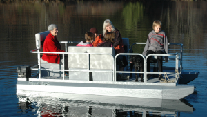 pond-craft-people-on-small-pontoon-boat